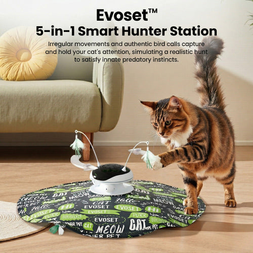 A tabby cat interacting with the Evoset 5-in-1 Smart Hunter Station, an interactive toy with feather teasers and a patterned cover.